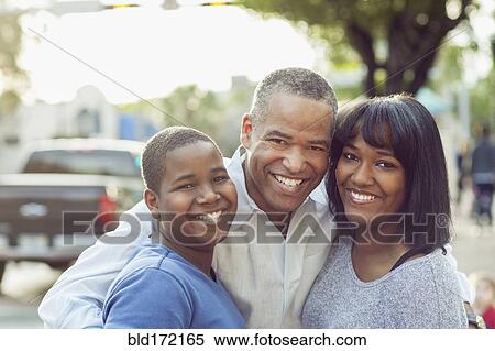 African American father and children hugging in city View Large Photo Image Stock Photography - African American father and children hugging in city. Fotosearch