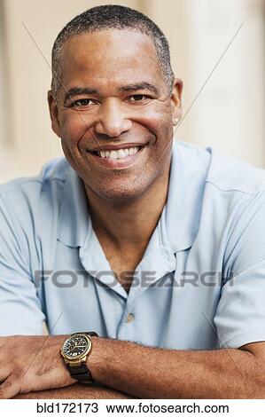 African American man smiling outdoors View Large Photo Image Stock Image - African American man smiling outdoors. Fotosearch