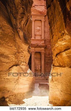 Al Khazneh building carved into cliff face, Petra, Jordan, Jordan View Large Photo Image Stock Photography - Al Khazneh building carved into cliff face, Petra, Jordan, Jordan. Fotosearch