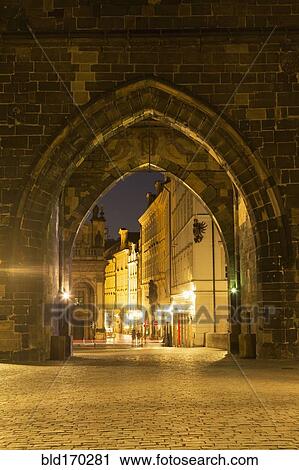 Arches in stone wall outside city View Large Photo Image Stock Image - Arches in stone wall outside city. Fotosearch