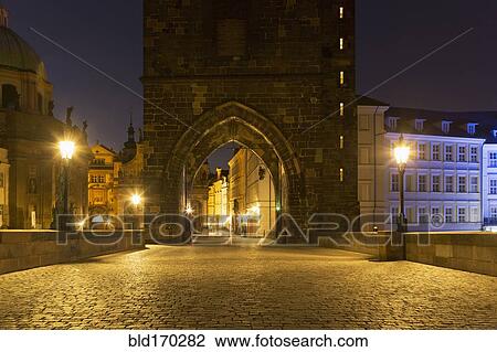 Arches in stone wall outside city View Large Photo Image Stock Image - Arches in stone wall outside city. Fotosearch