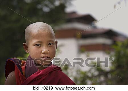Stock Photo - Asian boy wearing traditional robe. Fotosearch