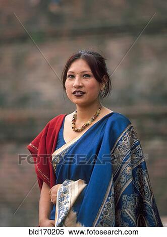 Asian woman wearing traditional clothing View Large Photo Image Stock Photography - Asian woman wearing traditional clothing. Fotosearch