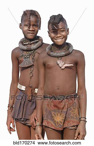 Picture - Black girls wearing traditional clothing and jewelry. Fotosearch