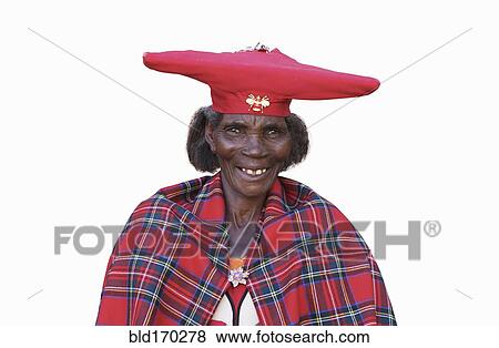 Stock Photo - Black woman wearing traditional hat and cape. Fotosearch
