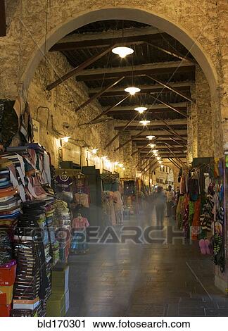 Blurred view of people shopping in indoor market View Large Photo Image Stock Image - Blurred view of people shopping in indoor market. Fotosearch