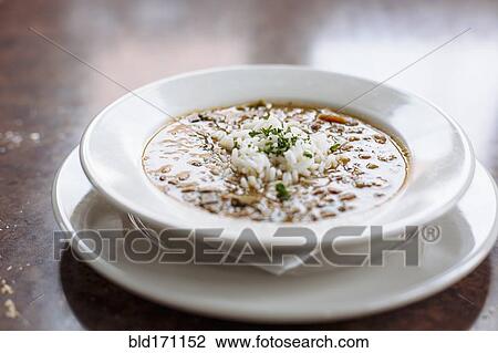 Stock Image - Bowl of gumbo with rice. Fotosearch