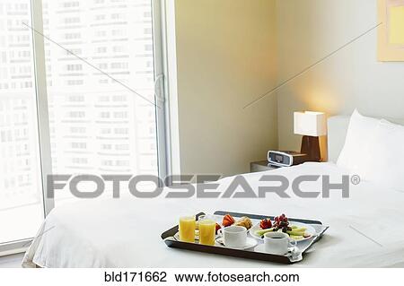 Breakfast tray on hotel bed View Large Photo Image Stock Image - Breakfast tray on hotel bed. Fotosearch
