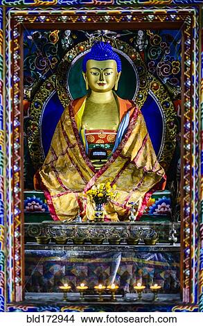 Picture - Buddha statue in shrine. Fotosearch