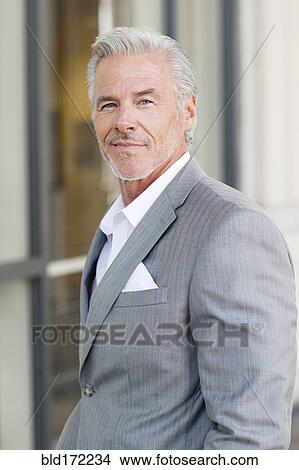Picture - Caucasian businessman smiling. Fotosearch