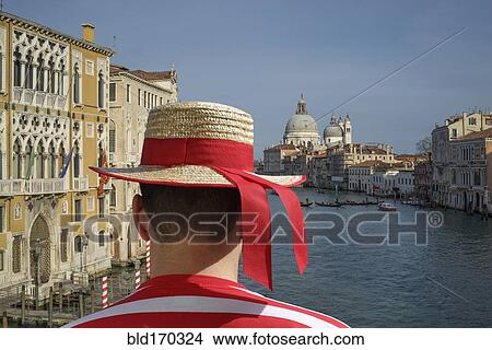 Caucasian gondolier admiring Venice cityscape, Veneto, Italy View Large Photo Image Picture - Caucasian gondolier admiring Venice cityscape, Veneto, Italy. Fotosearch