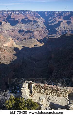 Caucasian woman admiring Grand Canyon, Arizona, United States View Large Photo Image Stock Image - Caucasian woman admiring Grand Canyon, Arizona, United States. Fotosearch