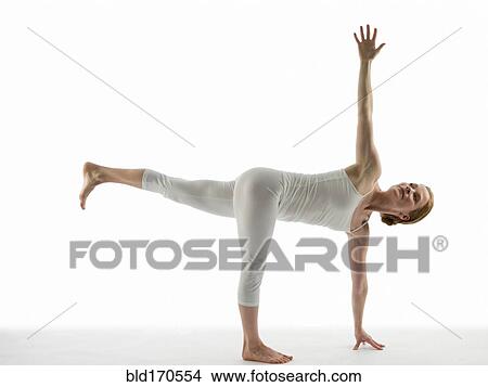 Caucasian woman practicing yoga View Large Photo Image Picture - Caucasian woman practicing yoga. Fotosearch
