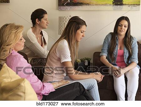 Stock Photo - Caucasian women talking in group therapy. Fotosearch