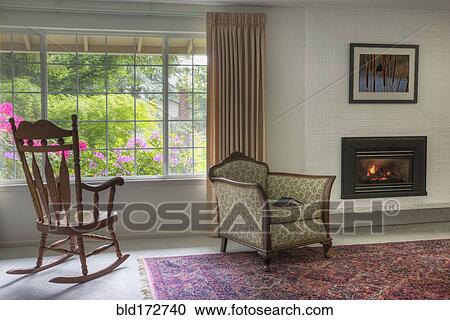 Chairs and fireplace in traditional living room View Large Photo Image Stock Image - Chairs and fireplace in traditional living room. Fotosearch