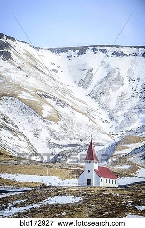 Church under snowy mountains in rural landscape View Large Photo Image Stock Photo - Church under snowy mountains in rural landscape. Fotosearch