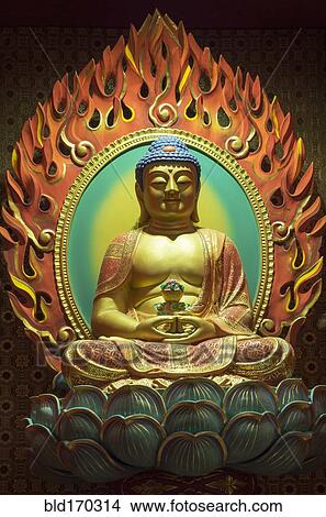 Picture - Close up of carved Buddha statue in temple. Fotosearch