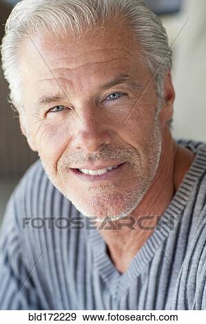 Stock Photo - Close up of Caucasian man smiling. Fotosearch