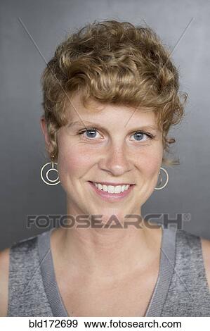 Stock Photo - Close up of Caucasian woman smiling. Fotosearch