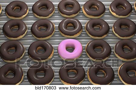 Stock Image - Close up of frosted donuts on baking pan. Fotosearch