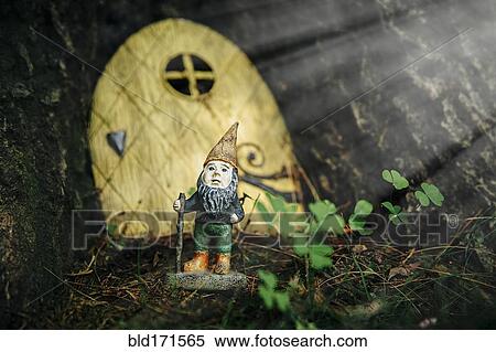 Close up of gnome figurine in garden View Large Photo Image Stock Photography - Close up of gnome figurine in garden. Fotosearch