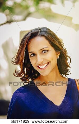 Stock Photo - Close up of Indian woman smiling. Fotosearch