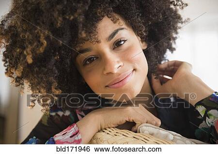 Close up of smiling mixed race woman View Large Photo Image Stock Photograph - Close up of smiling mixed race woman. Fotosearch