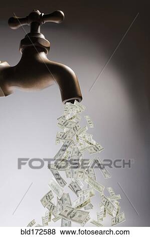 Stock Photo - Dollar bills pouring out of faucet. Fotosearch