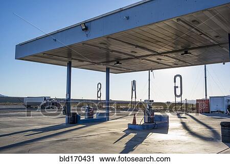 Empty gas station in remote landscape View Large Photo Image Stock Image - Empty gas station in remote landscape. Fotosearch