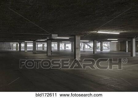 Stock Image - Empty lot in parking building. Fotosearch