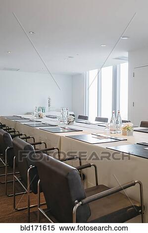 Empty meeting table in conference room View Large Photo Image Stock Photography - Empty meeting table in conference room. Fotosearch
