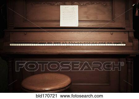 Empty piano with sheet music View Large Photo Image Stock Image - Empty piano with sheet music. Fotosearch