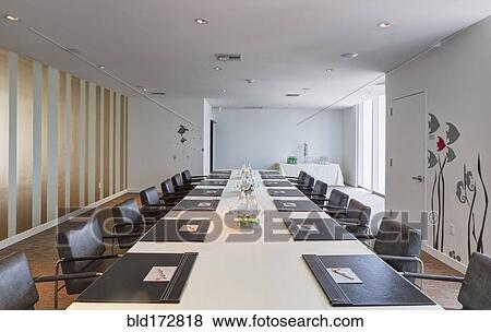 Stock Photo - Empty table in office meeting room. Fotosearch