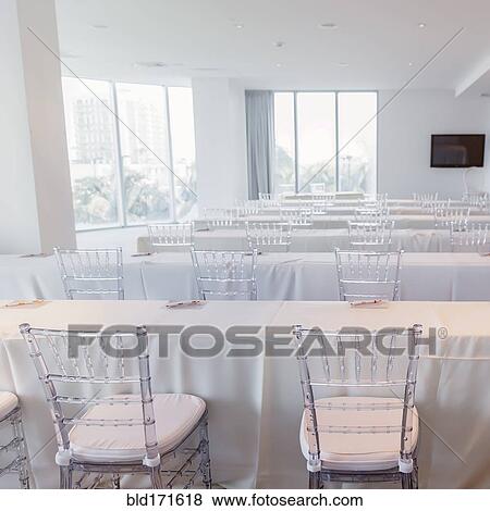 Stock Photo - Empty tables in conference room. Fotosearch