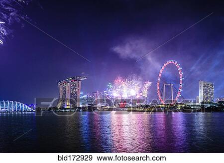 Stock Photo - Fireworks over Singapore city skyline, Singapore, Singapore. Fotosearch