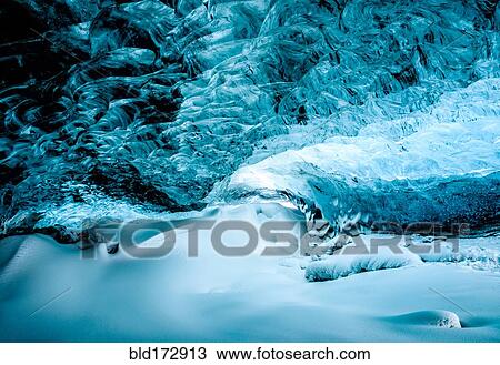 Stock Image - Glacier ceiling of ice cave. Fotosearch