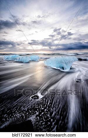Glaciers washing up on remote beach View Large Photo Image Stock Image - Glaciers washing up on remote beach. Fotosearch