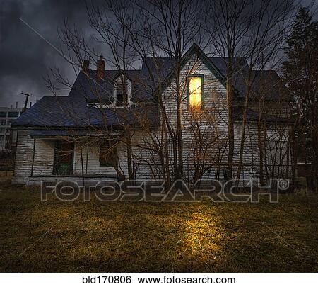 Glowing window casting light in backyard View Large Photo Image Stock Photograph - Glowing window casting light in backyard. Fotosearch
