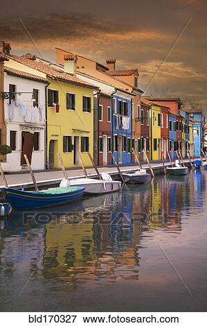 Gondolas parked in Venice Burano canal, Veneto, Italy View Large Photo Image Stock Photo - Gondolas parked in Venice Burano canal, Veneto, Italy. Fotosearch