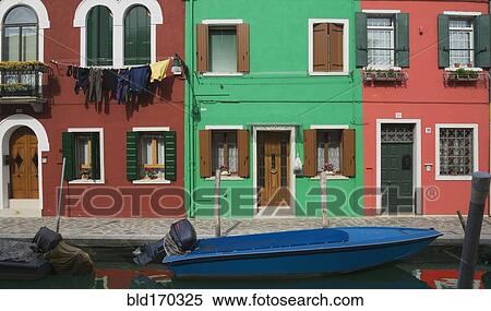 Stock Photography - Gondolas parked in Venice Burano canal, Veneto, Italy. Fotosearch