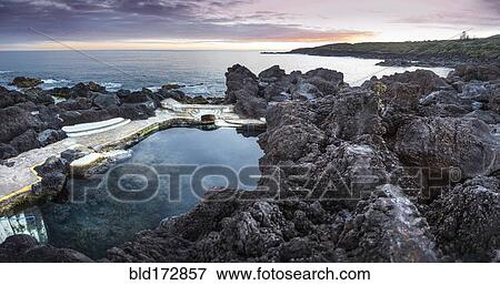 High angle view of rock formations in beach View Large Photo Image Stock Photo - High angle view of rock formations in beach. Fotosearch