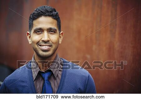 Stock Photo - Indian businessman smiling. Fotosearch