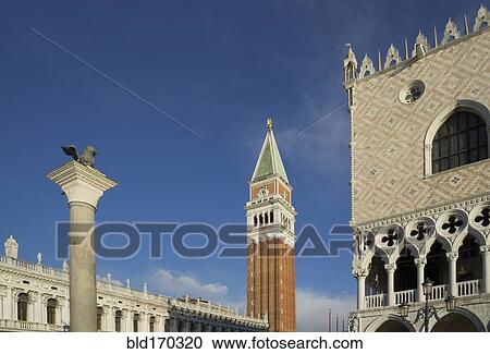 Stock Image - Low angle view of Venice buildings under blue sky, Veneto, Italy. Fotosearch