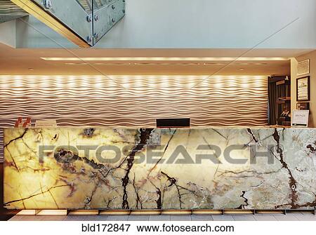 Marble reception desk in hotel lobby View Large Photo Image Stock Photo - Marble reception desk in hotel lobby. Fotosearch