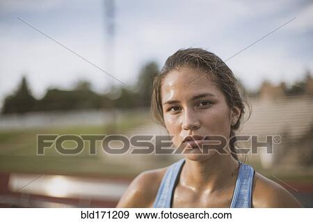 Mixed race athlete on sports field View Large Photo Image Stock Photo - Mixed race athlete on sports field. Fotosearch