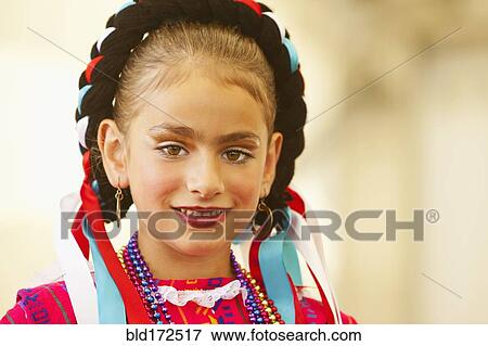 Mixed race girl wearing traditional makeup and dress View Large Photo Image Stock Photo - Mixed race girl wearing traditional makeup and dress. Fotosearch