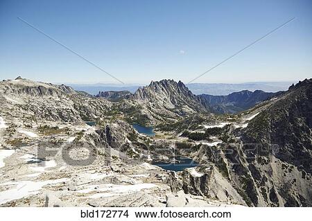 Picture - Mountains and lakes in remote landscape. Fotosearch