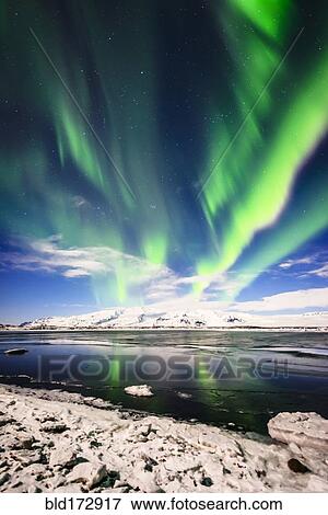 Northern lights reflecting in still remote river View Large Photo Image Stock Photo - Northern lights reflecting in still remote river. Fotosearch