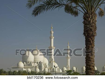 Ornate building domes and spires under blue sky, Abu Dhabi, Abu Dhabi Emirate, United Arab Emirates View Large Photo Image Stock Photograph - Ornate building domes and spires under blue sky, Abu Dhabi, Abu Dhabi Emirate, United Arab Emirates. Fotosearch