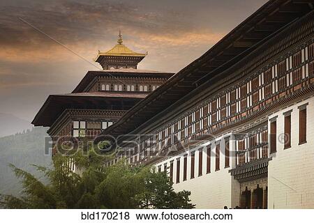 Stock Photo - Ornate building under clouds. Fotosearch